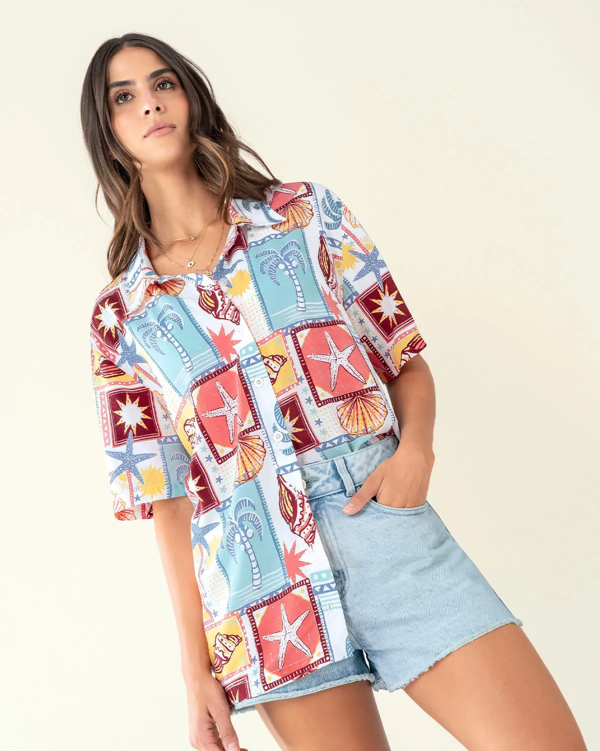 Blusa oversized manga corta