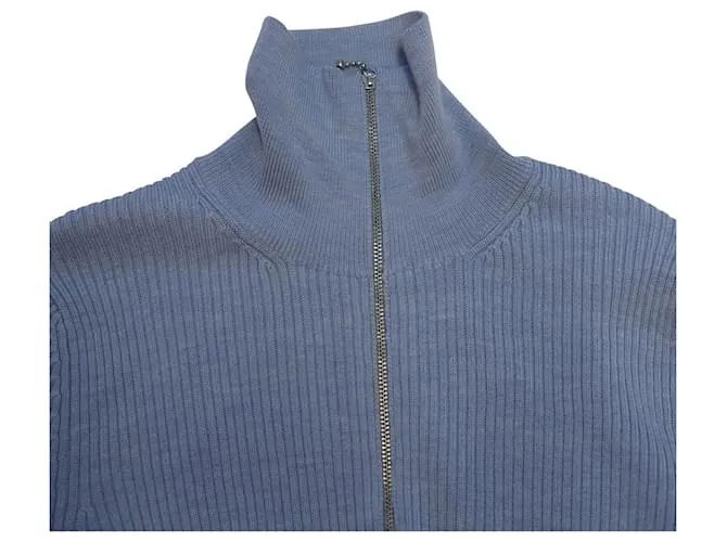 Jersey Ganni con cuello subido y cremallera en lana merino azul 