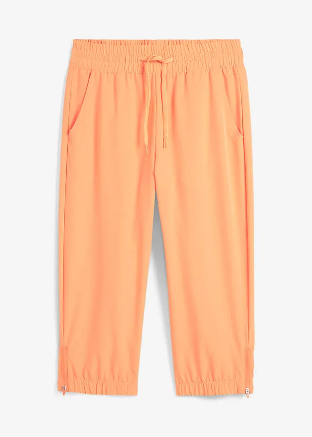 Pantalón funcional de largo capri y secado rápido Naranja claro