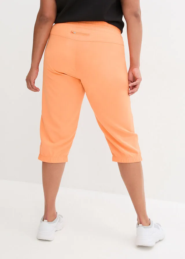 Pantalón funcional de largo capri y secado rápido Naranja claro